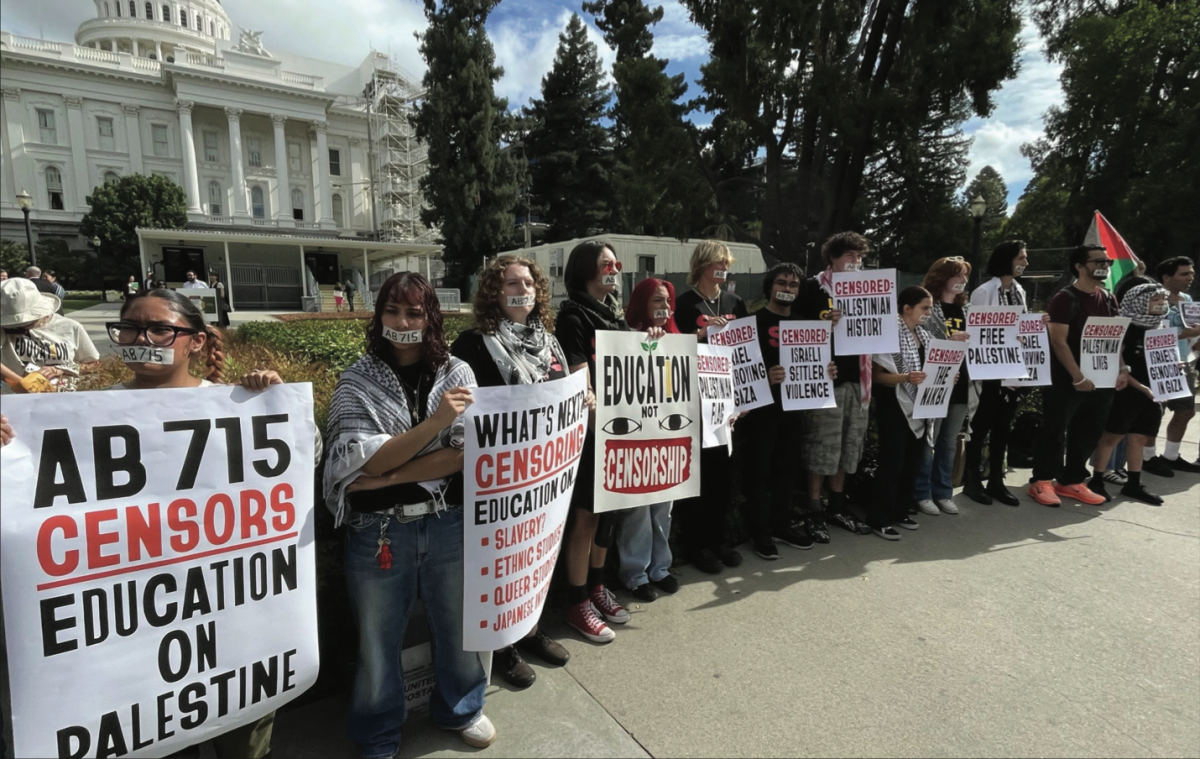 Members of Students for Quality Education protest with signs outside the State Capitol in Sacramento to oppose AB 715 on Tuesday, Sept. 9.