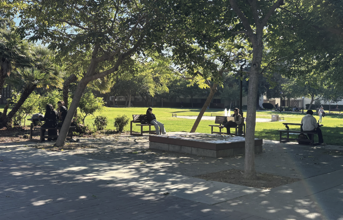 San José State University students study while using the newly installed convertible benches, while some use them as functional tables on Monday morning.