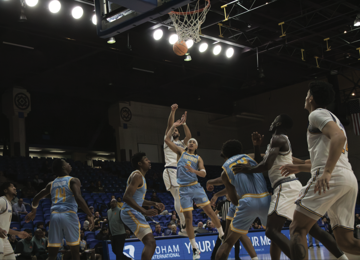 Spartan freshman guard Ben Roseborough shoots to score against Southern University’s defense on Friday.