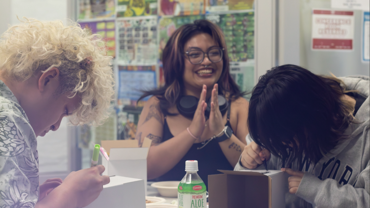 Students craft balikbayan boxes as they listen to MOSAIC cultural programmer Kailyn Altringer’s presentation on ‘Unboxing Colonialism’ on Oct. 29.