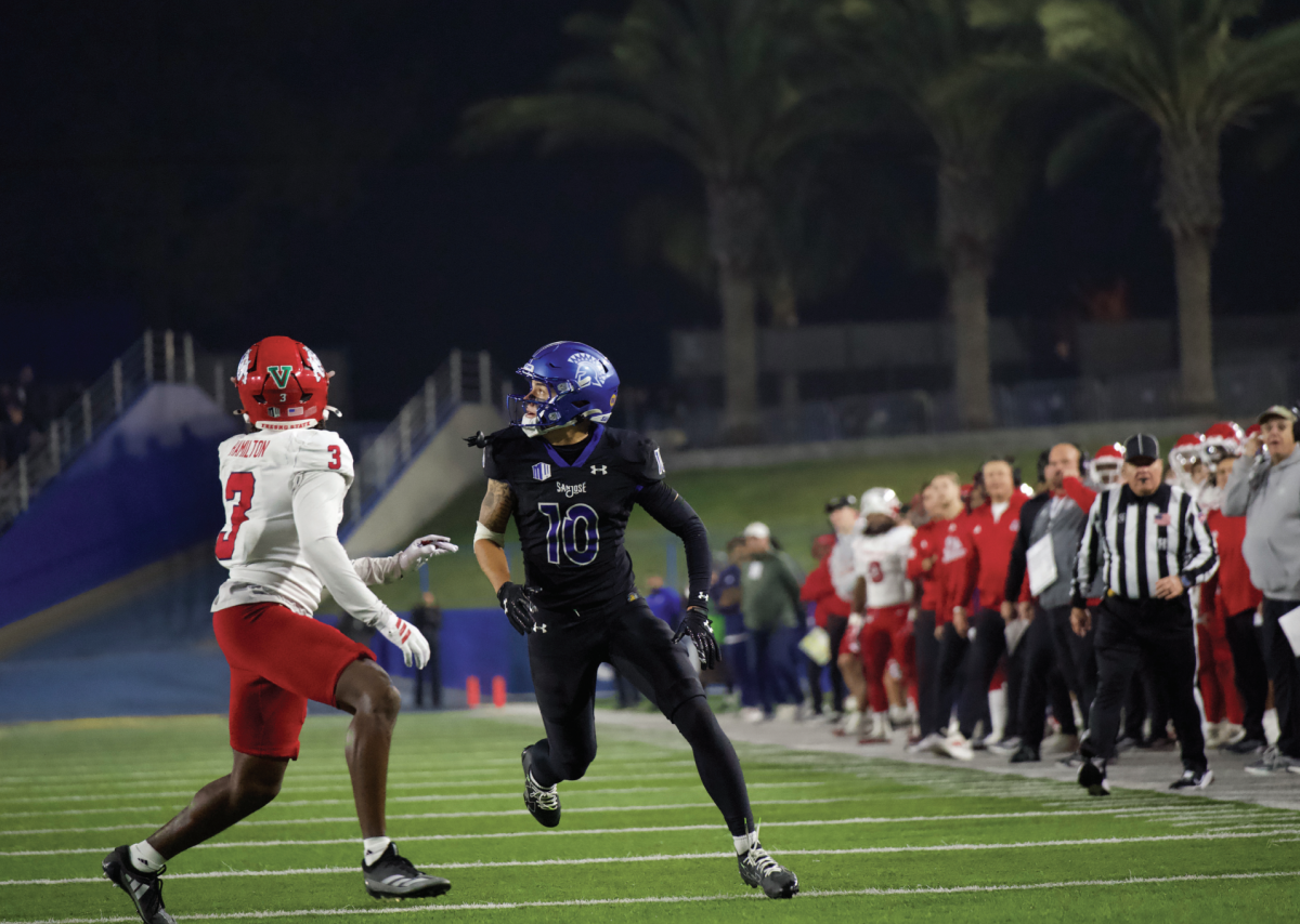 Sophomore wide reciever Danny Scudero (10) prepares to evade senior defensive back for Fresno Al’zillion Hamilton (3) during the Battle for the Valley versus Fresno State on Saturday.
