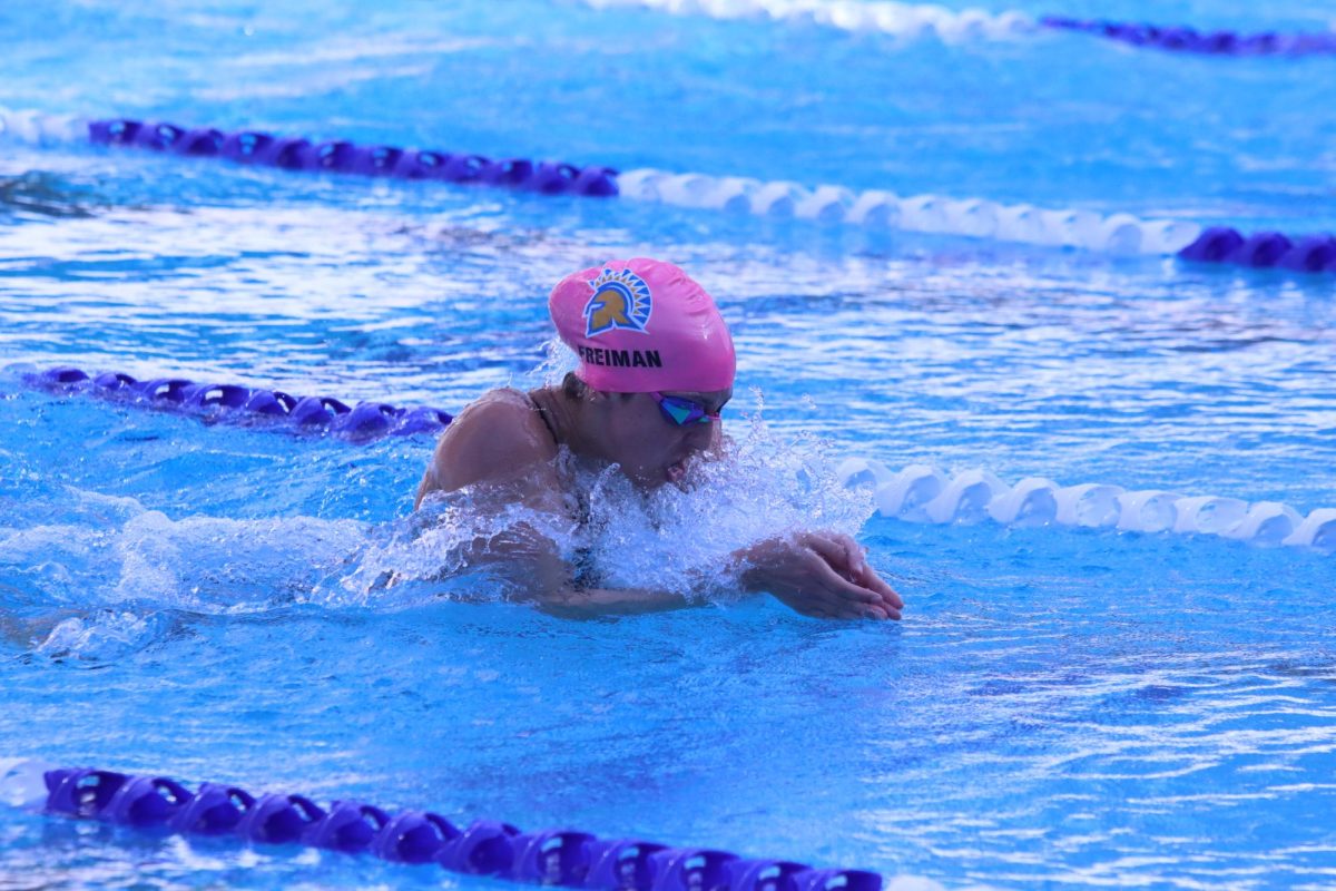 Senior Ela Freiman cuts through the water while performing the breaststroke. Freiman is the record holder at the school in all three individual medley events. 