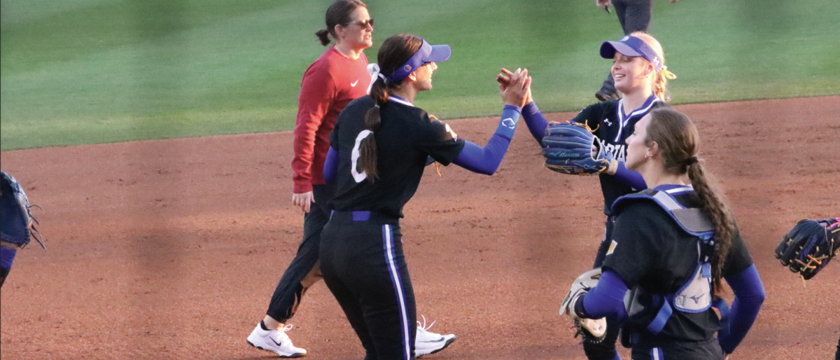 Spartans fi elder Taylor Chillingworth (left) and pitcher Norah Coulsell (right) celebrate after escaping the first inning at the Stanford Softball Stadium on Friday.