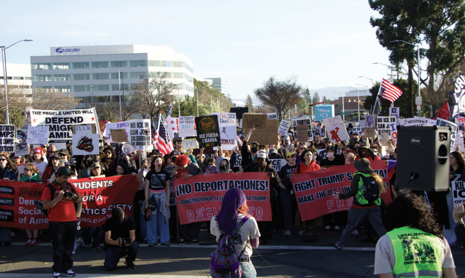 Pan Garcia Breceda gives a speech to demonstators protesting ICE at the intersection of Patrick Henry Drive and Great America Parkway on Sunday.