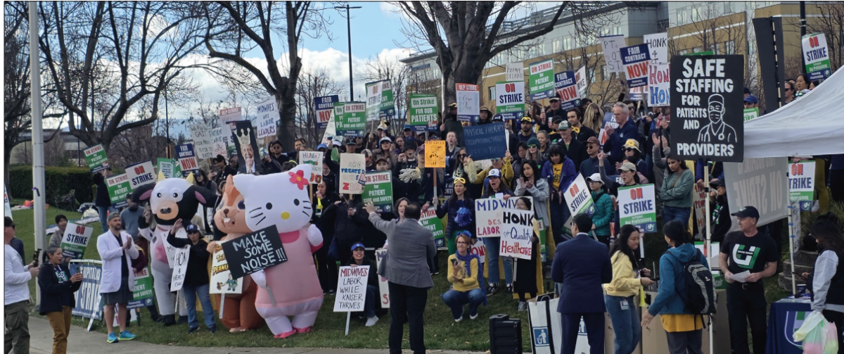 Protesters strike outside of the Kaiser Permanente Santa Clara Medical Center on Tuesday in support of new contract negotiations and patient safety.