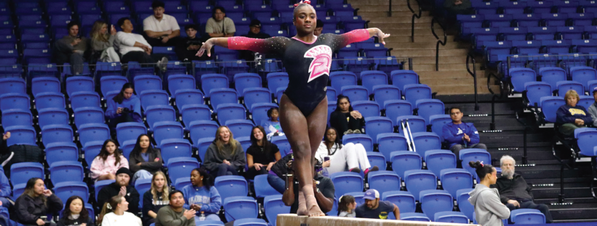 Sophomore all-around gymnast Kaviana Jurries poses atop a balance beam during the My Cause meet on Sunday. This is Jurries’ second season with San José.