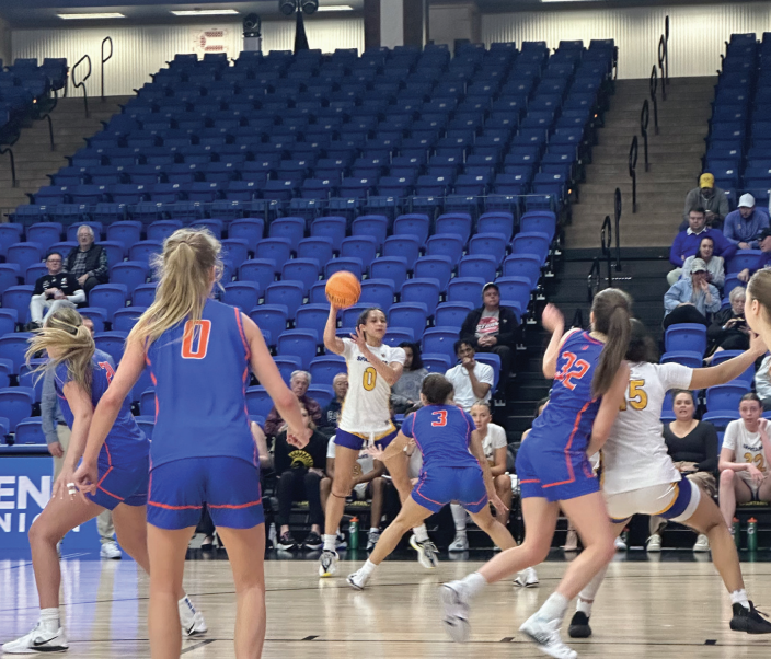 Katarina Anderson (0) holds up an inside pass to guard/forward Maya Anderson (15) in the key. Maya Anderson completed the game with 20 points.