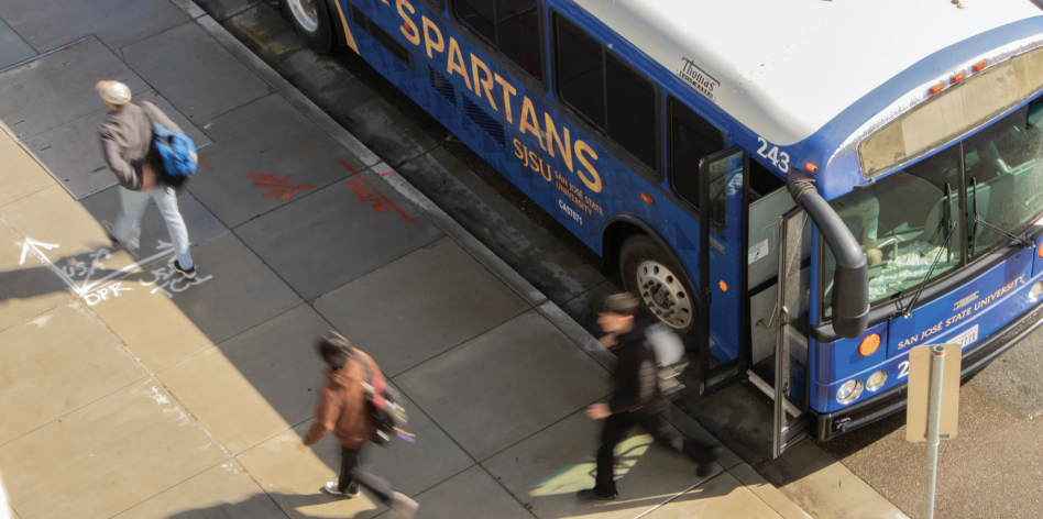 Students step off of the shuttle bus outside the South Campus Garage on Wednesday, Feb. 18.