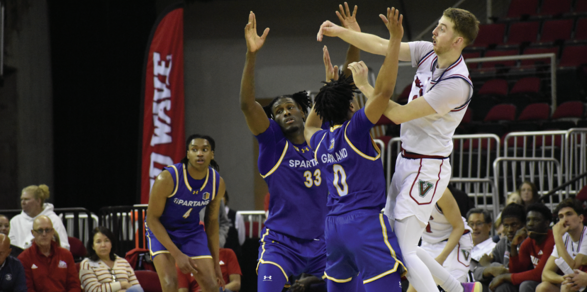 SJSU junior guard Colby Garland (0), junior forward Marcus Overstreet (33) and freshman guard Melvin Bell Jr. (4) defend against Fresno State during Tuesday's game.