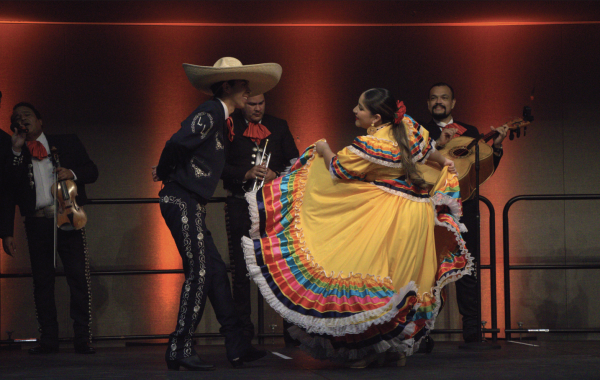 Grupo Folklórico Los Laureles dances to Mariachi Tapatio’s music in the Student Union Ballroom on Tuesday for San José State’s CHI Day celebration.