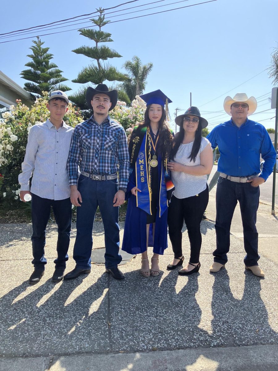 Andrea Pérez with her family at her home before her graduation at Mt. Eden High School on June 6, 2025.