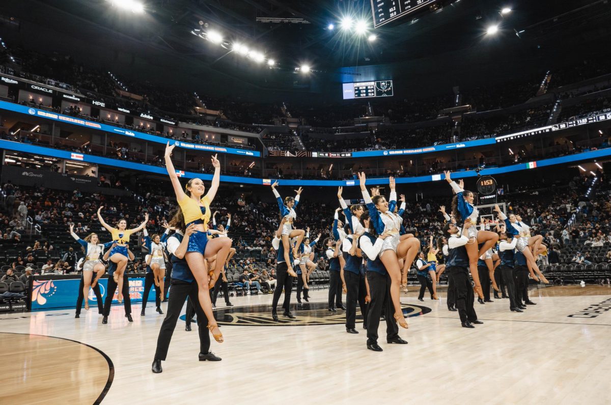 Members of Sparchata and Spartan Mambo perform during halftime at a Golden State Warriors game on March 25.