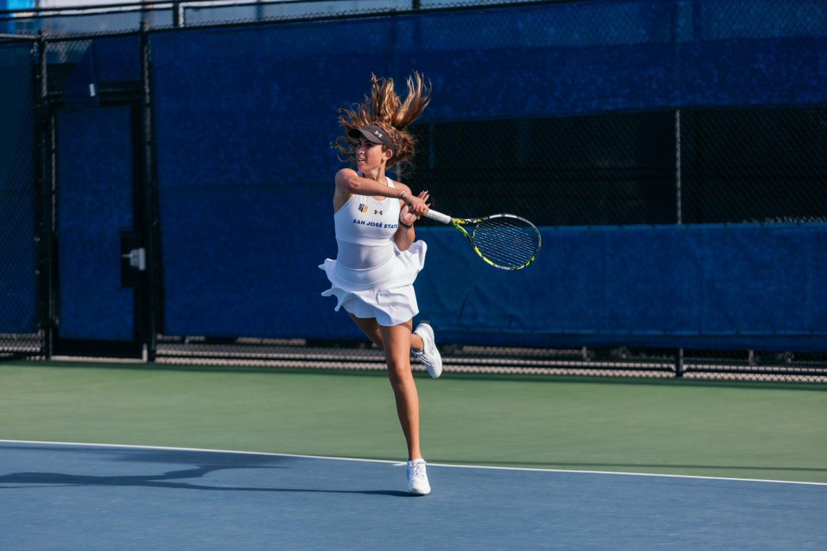 Sophomore Emma Fantousis follows through after a return. She won her first championship match during the Cal Fall Invitational in 2024 as a new Spartan.
