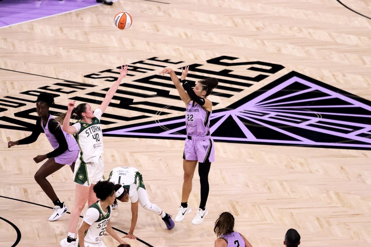 Golden State Valkyries guard Veronica Burton (22) hits her third 3-pointer of the fi rst half while Storm forward Grace VanSlooten (40) jumps to contest her shot. Burton was
the 2025 WNBA Most Improved Player, and made the All-Defensive Second Team, leading Golden State to the playoffs in its inaugural season last year.