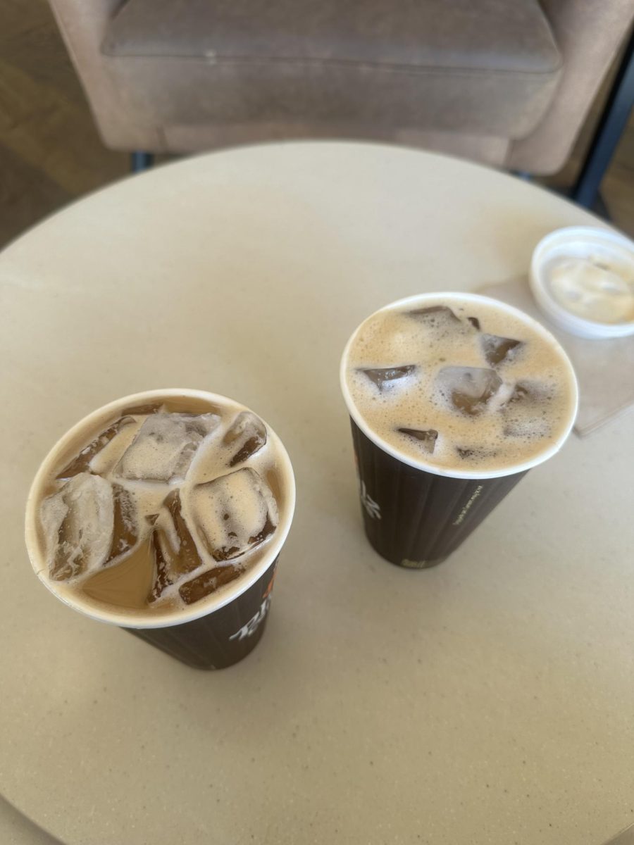 An iced Caramel Coconut (left) and iced Salted Butterscotch (right) sit side by side. They are Philz Coffee’s new limited spring season cold brew drinks.