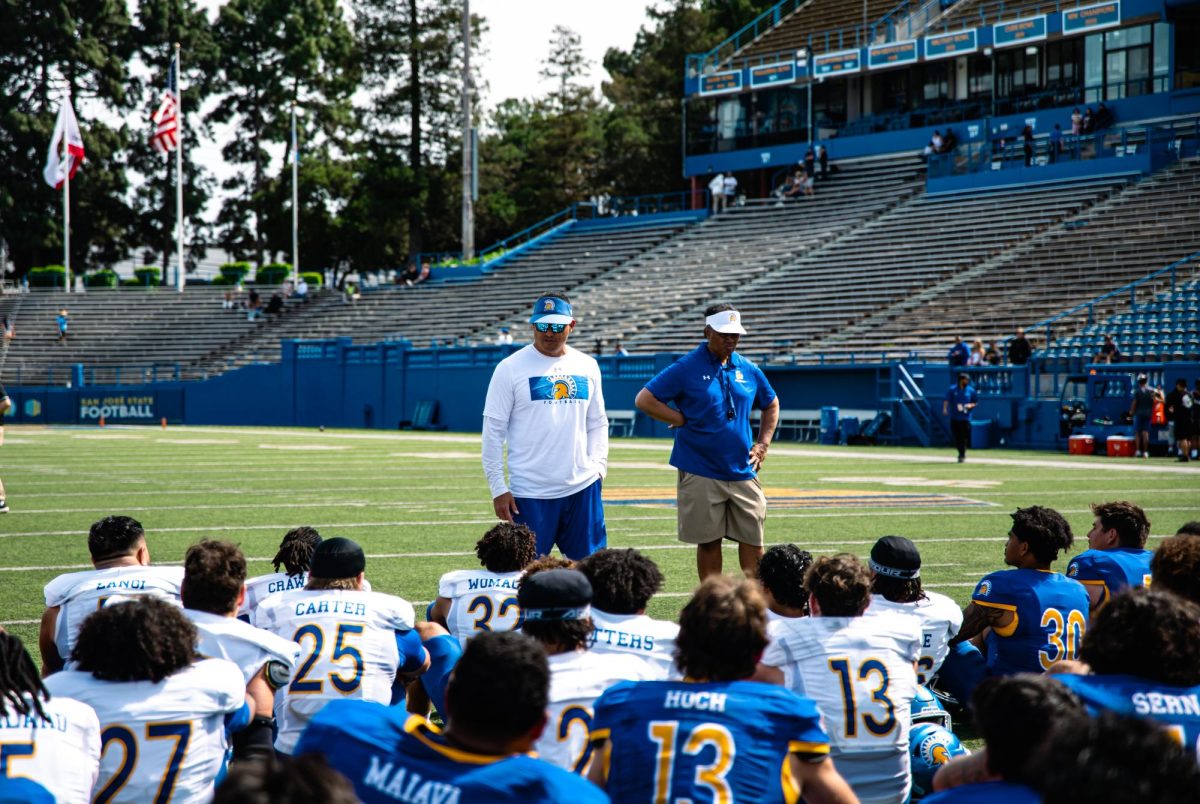 SJSU head coach Ken Niumatalolo stands before the squad prior to Saturday’s spring game at CEFCU Stadium. The Spartans look to improve on last season’s 3-9 record.