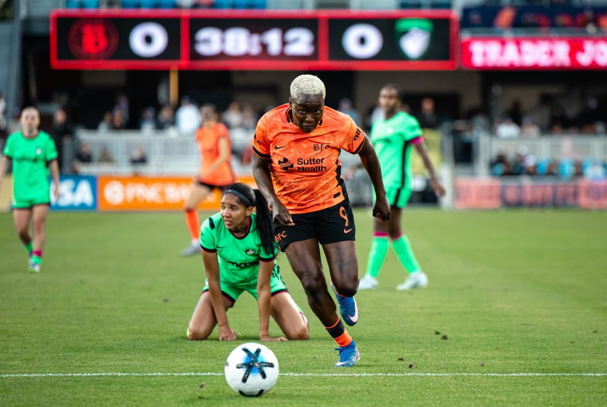 Midfielder Racheal Kundananji chases down the ball.