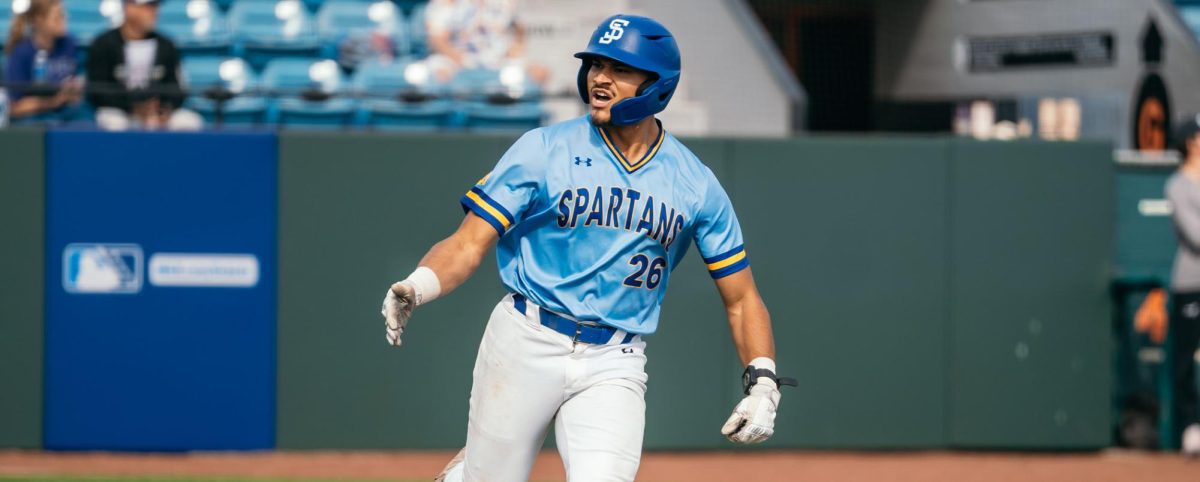 Senior outfielder Neil Jansen (26) runs the bases after hitting a two-run home run in the second game of the series on Saturday in San José.
